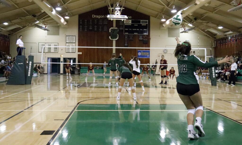 Sophia Riebli serves for the Sonoma Valley's varsity volleyball team at Pfeiffer Gym. The junior setter led the Dragons over the Casa Grande Gauchos on Sept. 19 in a five-set nail-biter. (Christian Kallen / Index-Tribune)