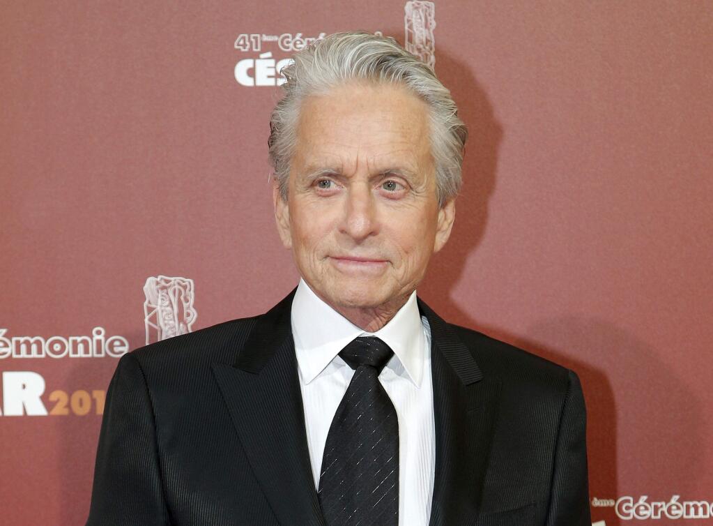 FILE - In this Feb. 26, 2016 file photo, U.S actor Michael Douglas arrives at the 41st French Cesar Awards Ceremony, in Paris. A woman who worked for Douglas in the late 1980s says he fondled himself in front of her, an allegation the actor has vigorously denied. Journalist and author Susan Braudy appeared Friday, Jan. 19, 2018 on NBC's 'Today' show. Earlier this month, Douglas said he anticipated an upcoming report containing allegations and called it a 'complete lie, fabrication.'(AP Photo/Thibault Camus, File)