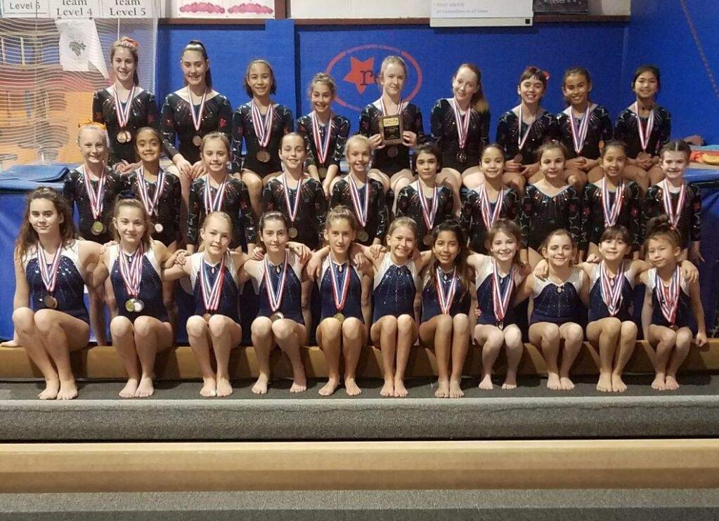JOHN JACKSON/ARGUS-COURIER STAFFMedmbers of the Redwood Empire Gymnastics team concluded their competitive season with outstanding performances in State Championship meets.