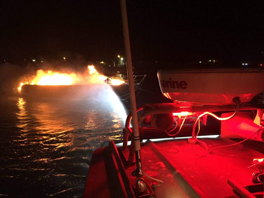 Bodega Bay fire crews put out a fire on a sailboat anchored in Bodega Harbor that went up in flames, Wednesday, Nov. 16, 2016. (Photo: Bodega Bay Fire)