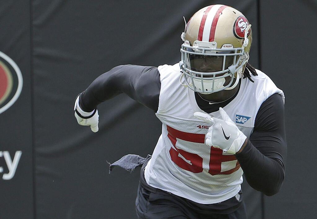 In this May 30, 2018, file photo, San Francisco 49ers linebacker Reuben Foster runs during a practice at the team's training facility in Santa Clara. San Francisco figures to get a big boost on defense from Foster, who returns this week after he was suspended for the first two games of the season for violating the league's substance abuse and personal conduct policy. (AP Photo/Jeff Chiu, File)