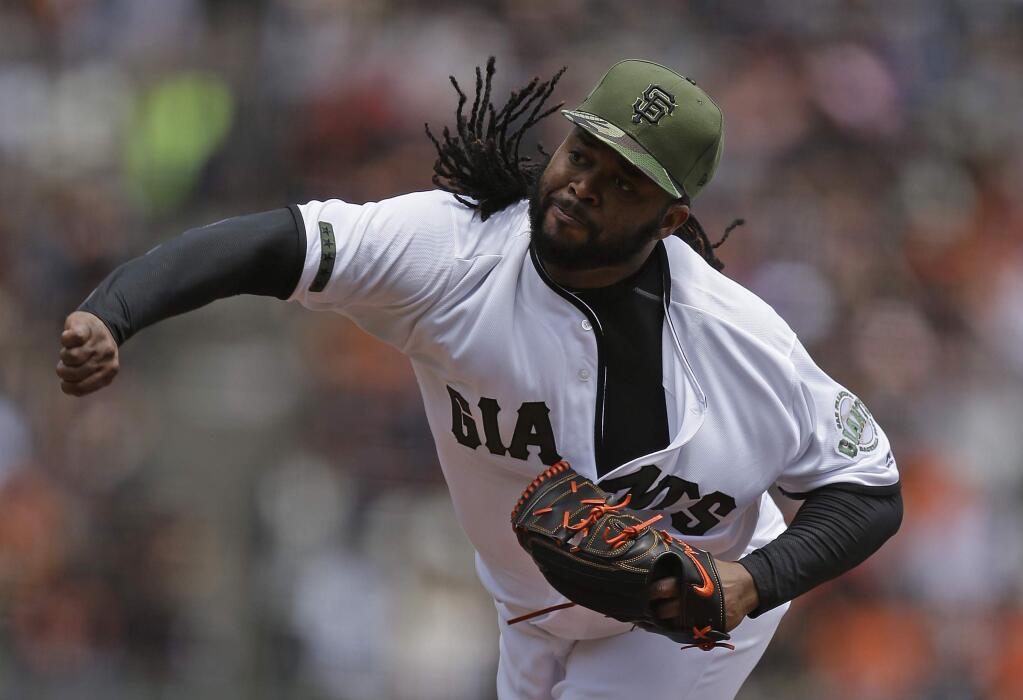 San Francisco Giants pitcher Johnny Cueto works against the Atlanta Braves in the first inning of a baseball game Sunday, May 28, 2017, in San Francisco. (AP Photo/Ben Margot)