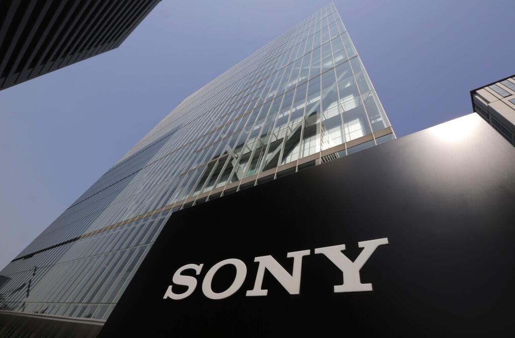 FILE - In this May 22, 2013 file photo, Sony's logo is seen outside the company's headquarters in Tokyo. A U.S. official says North Korea has been linked to the unprecedented act of cyberwarfare against Sony Pictures that exposed tens of thousands of sensitive documents and escalated to threats of terrorist attacks that ultimately drove the studio to cancel all release plans for the film at the heart of the hack, 'The Interview.'(AP Photo/Itsuo Inouye, File)