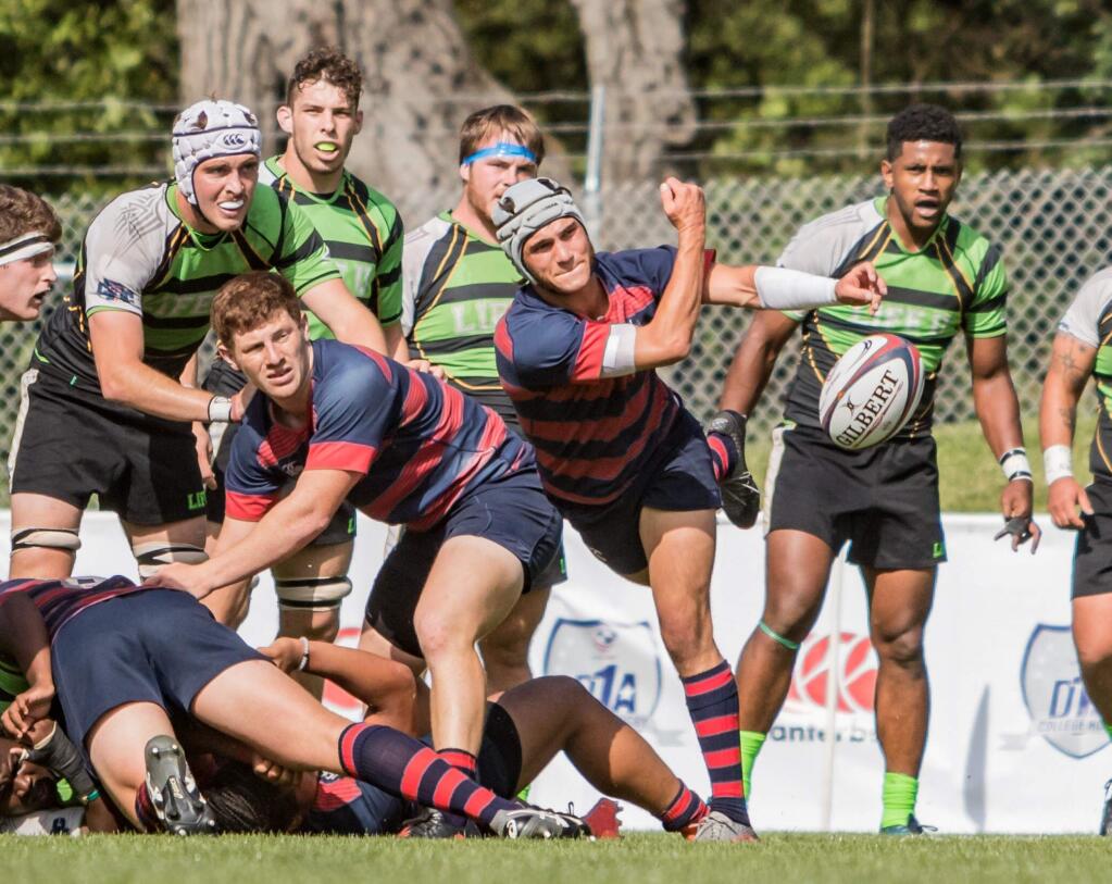 PHOTO FROM smugmug.comPetaluma High School graduate Holden Yungert (center) led St. Mary's to the rugby D1 national championshjip and is now ready to move on, possibly to professional rugby.