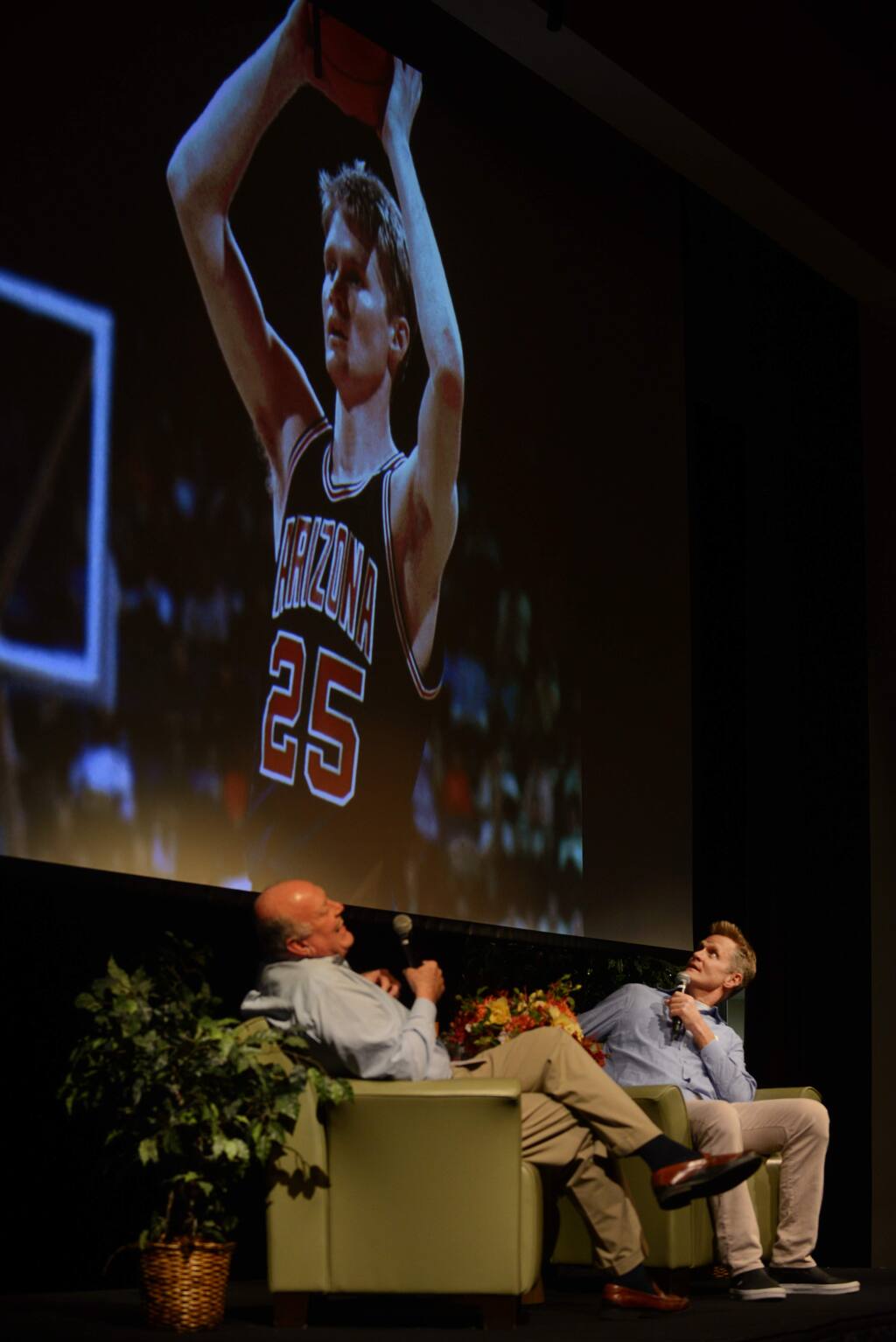 Head Coach of the Golden State Warriors Steve Kerr, right, checking out an old photo from his college days during a conversation with former Head Coach and General Manager of the Warriors Garry St. Jean, left, at the Sonoma Speakers Series held Monday evening at Hanna Boys Center in Sonoma, California. October 1, 2018.(Photo: Erik Castro/for The Press Democrat)