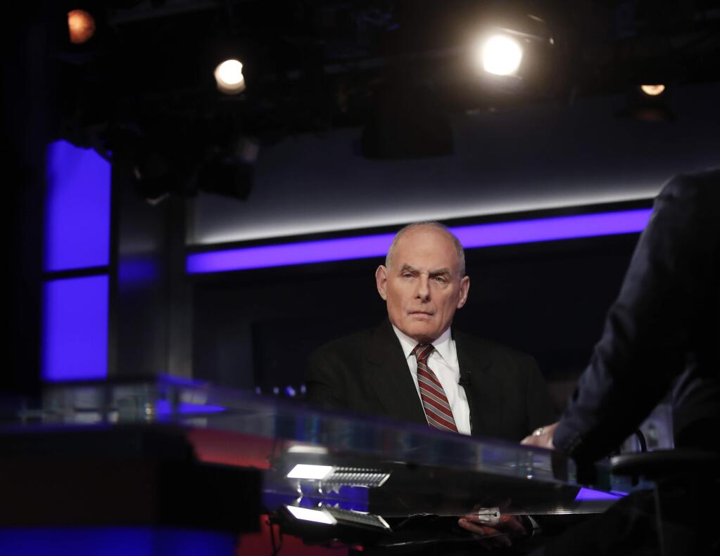 White House chief of staff John Kelly pauses to look to a video monitor as he appears on Special Report with Bret Baier on Fox News in Washington, Wednesday, Jan. 17, 2018. Kelly says Trump has evolved on many issues since the campaign. Kelly says in an interview with Baier that 'there's been an evolutionary process that this president's gone through' on issues ranging from Afghanistan to his promised Southern border wall. (AP Photo/Carolyn Kaster)