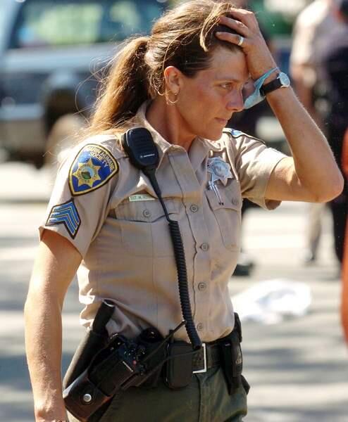 Marin County Humane Society Sgt. Michelle Rogers reacts after removing goats from a tractor trailer that overturned Friday, July 6, 2007, killing 243 of the animals in San Rafael, Calif. The goats were being transported to Mill Valley, Calif., for brush grazing when the accident occurred. (AP photo/Independent Journal, Frankie Frost) ** NO SALES, MAGS OUT, MANDATORY CREDIT **
