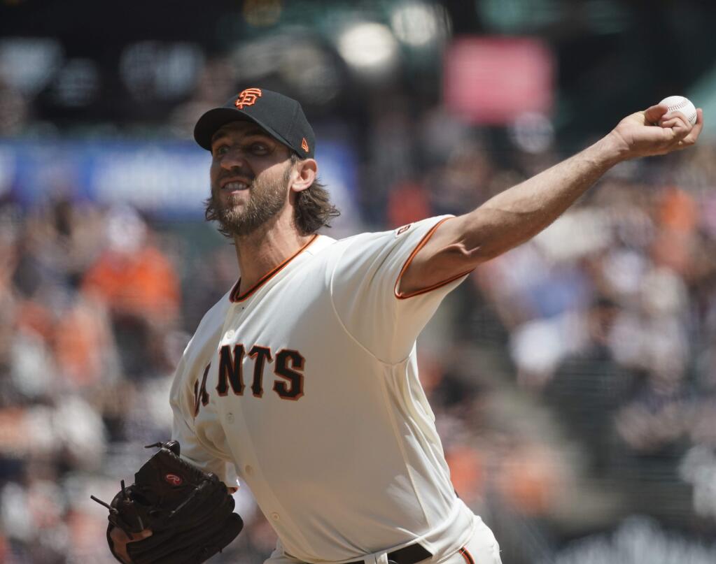 San Francisco Giants pitcher Madison Bumgarner works against the Colorado Rockies during the first inning Saturday, April 13, 2019, in San Francisco. (AP Photo/Tony Avelar)
