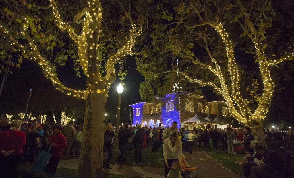 On Saturday night, Sonoma Plazas Christmas lights - many thousands of them - were officially turned on and will adorn the center of town until after the holidays. The horseshoe was packed with revelers who enjoyed free cookies, cider and hot chocolate. Seasonal entertainment was provided by the Transcendence Theatre Company. (Photos by Robbi Pengelly/Index-Tribune)