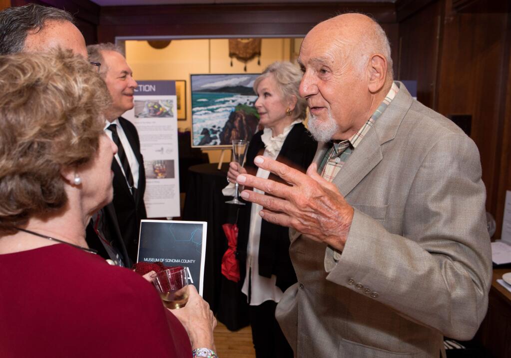 Walter Byck, owner of Paradise Ridge Winery, right, talks to other guests, at the Museums of Sonoma County Gala and After-Party event held at the Art Museum of Sonoma County in Santa Rosa, on Saturday, September 29, 2018. (Photo by Darryl Bush / For The Press Democrat)