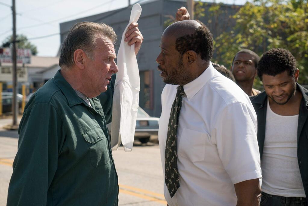Tom Wilkinson and Forest Whitaker in a scene from 'Burden,' about an idealistic Reverend Kennedy (Whitaker) who resolves to do everything in his power to prevent long-simmering racial tensions from boiling over when a museum celebrating the Ku Klux Klan opens in a small South Carolina town. (101 Studios)