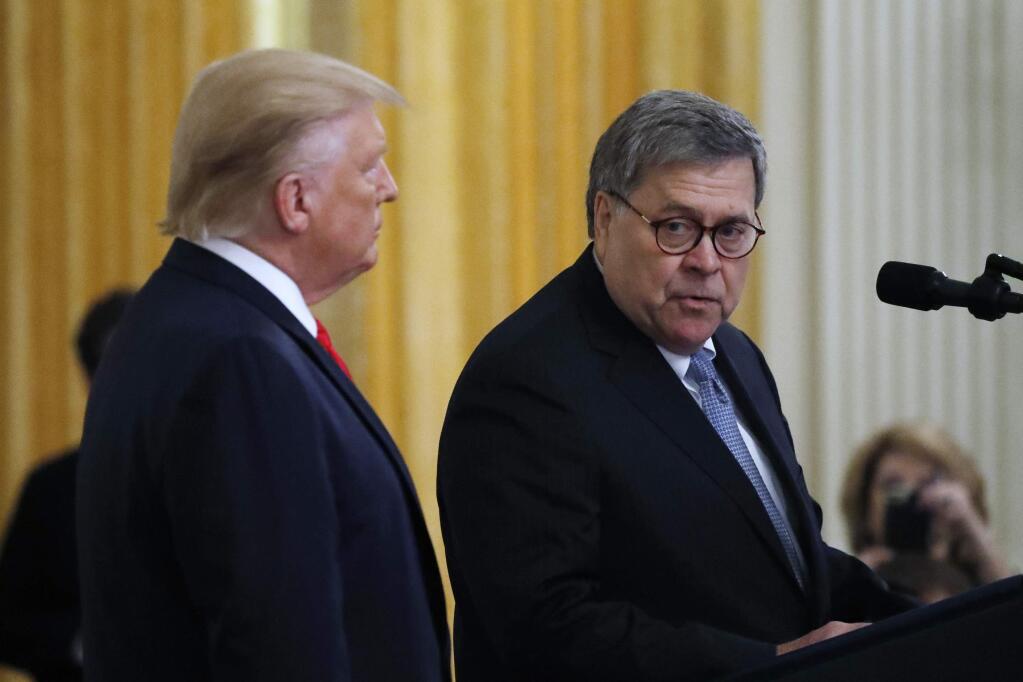 FILE - In this Monday, Sept. 9, 2019, file photo, Attorney General William Barr speaks as President Donald Trump listens during a ceremony in the East Room of the White House, in Washington. Trump recently asked the Australian prime minister and other foreign leaders to help Barr with an investigation into the origins of the Russia probe that shadowed his administration for more than two years, the Justice Department said Monday. Sept. 30. (AP Photo/Alex Brandon, File)