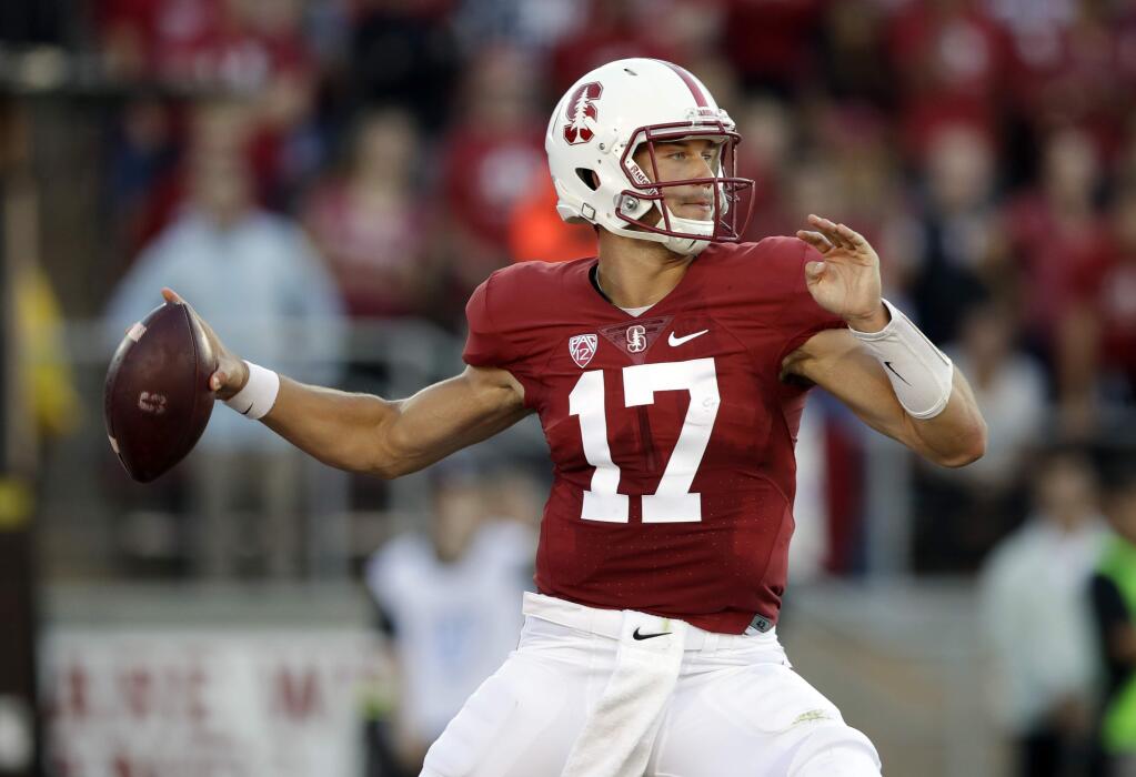 Stanford quarterback Ryan Burns throws against Kansas State during the first half of an NCAA college football game Friday, Sept. 2, 2016, in Stanford, Calif. (AP Photo/Marcio Jose Sanchez)