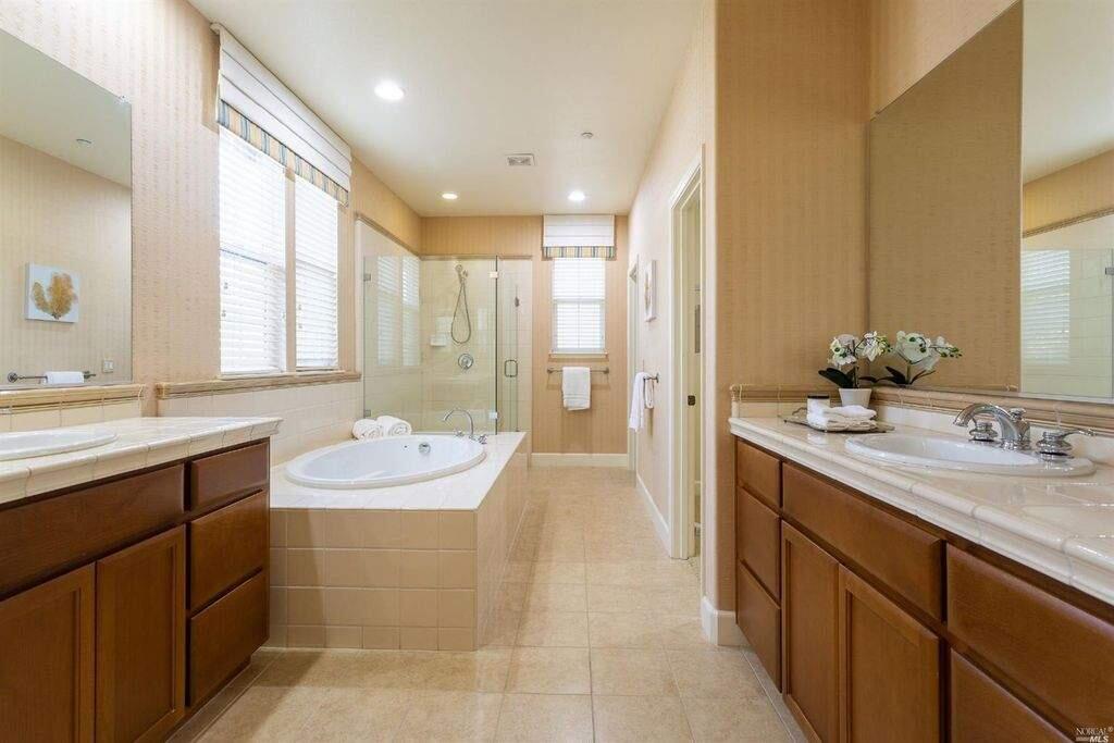 A spacious master bathroom with a large soaking bathtub and his and hers vanities. Property listed by Jen Birmingham/Coldwell Banker, coldwellbanker.com, 707-762-6611. (Courtesy of NRT Northern California)