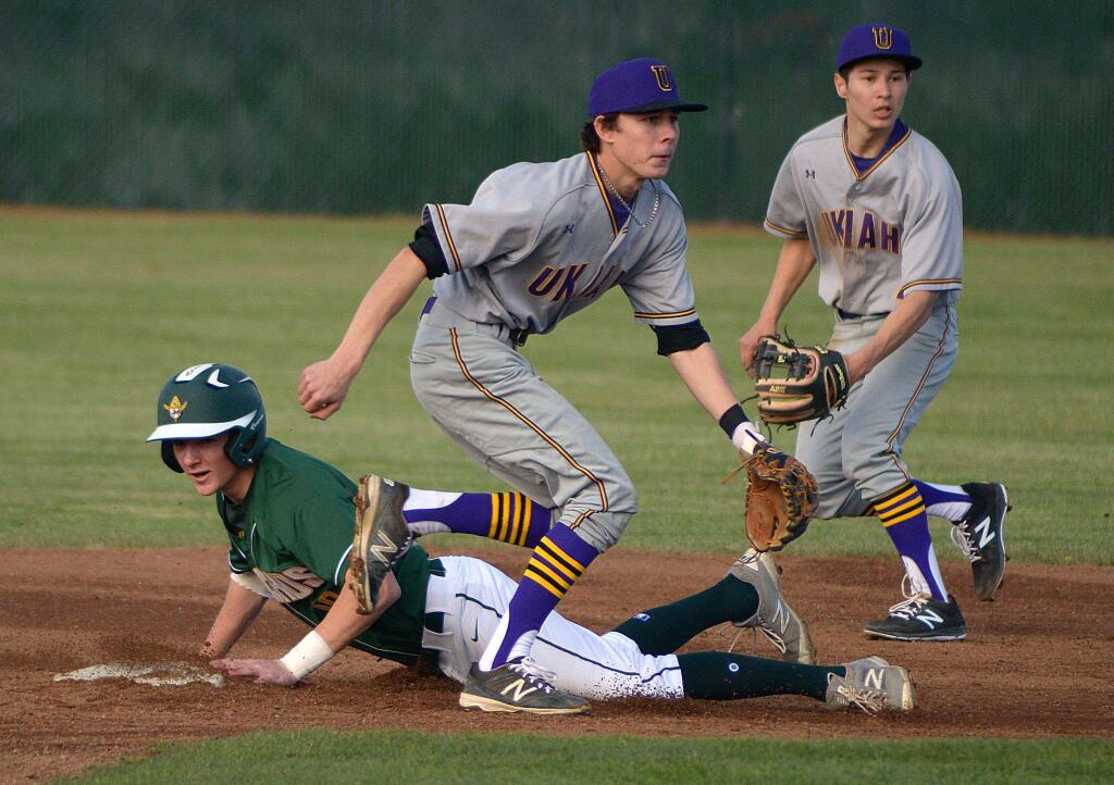 SUMNER FOWLER/FOR THE ARGUS-COURIERCasa Grande's Joe Lampe successfully steals second base in the Gauchos' 8-2 win over Ukiah.