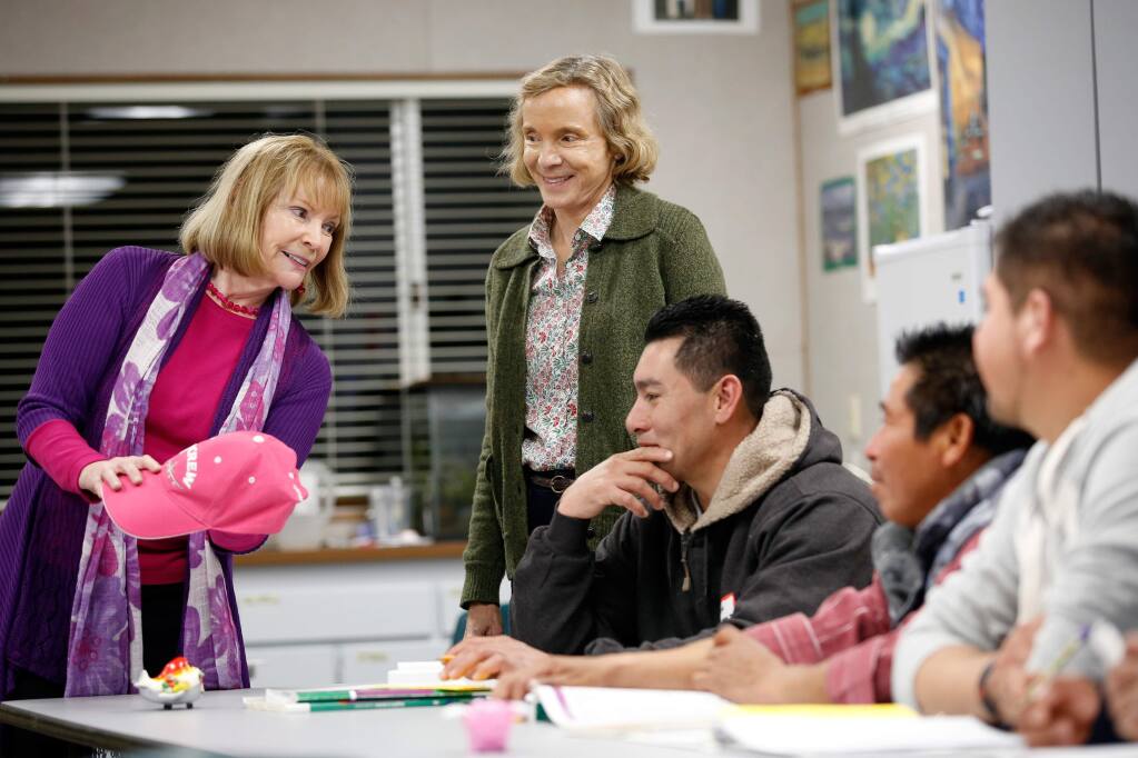 Lynn Horowitz, standing at center, director of the Alexander Valley Adult and Family ESL, observes one of the program classes taught by instructor Sylvie Anne Moore, left, at the Alexander Valley School, in Healdsburg, California on Thursday, Jan. 19, 2017. Funders include Community Foundation Sonoma County, John Jordan Foundation, Our Family Foundation and Uplands Family Foundation. (Alvin Jornada / The Press Democrat)