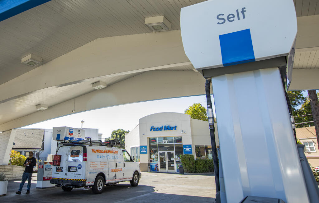 Customers get gas and snacks Wednesday August 24, 2022, at the Chevron on the corner of Mendocino and College avenues in Santa Rosa, California. (Chad Surmick / The Press Democrat)