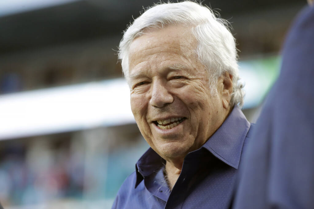FILE - In this Feb. 2, 2020, file photo, New England Patriots owner Robert Kraft walks on the field before the NFL Super Bowl 54 football game between the San Francisco 49ers and Kansas City Chiefs, in Miami Gardens, Fla. Florida prosecutors dropped a misdemeanor charge against New England Patriots owner Kraft on Thursday, Sept. 24, 2020, saying they couldn't go forward after courts blocked their use of video that allegedly shows him paying for massage parlor sex. (AP Photo/Wilfredo Lee, File)