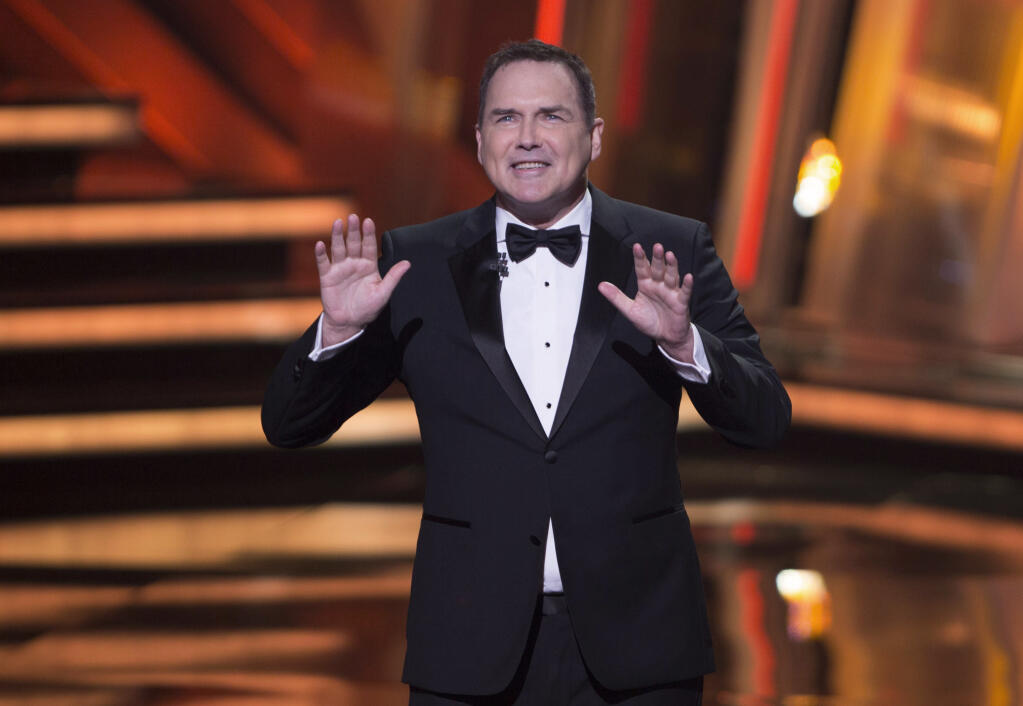 Norm Macdonald begins as host of the Canadian Screen Awards in Toronto on Sunday, March 13, 2016. (Peter Power/The Canadian Press via AP)
