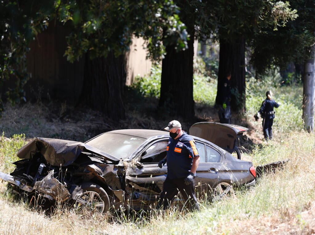 Authorities investigate a crash in which a driver died on Highway 12 near Dutton Avenue in Santa Rosa on Tuesday, July 7, 2020. (Beth Schlanker/The Press Democrat)