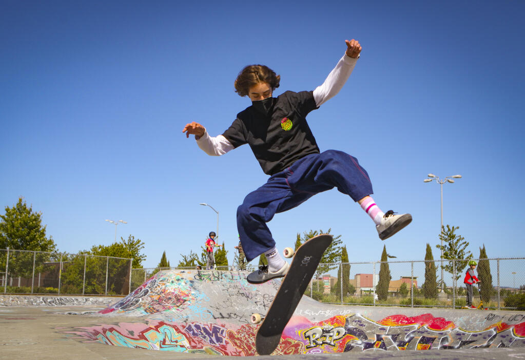 Minna Stess, 15, does a kick flip at the Petaluma skate park in this June Argus-Courier file photo. Stess was recently named an alternate on the U.S. Olympic skateboarding team. (CRISSY PASCUAL/ARGUS-COURIER STAFF)