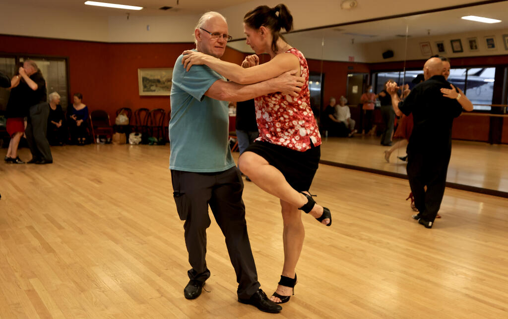 Jett Langston, left, and Rachel Mayorga high step during Tango Tuesdays, August 16, 2022 at Snoopy's Home Ice in Santa Rosa. (Kent Porter / The Press Democrat) 2022