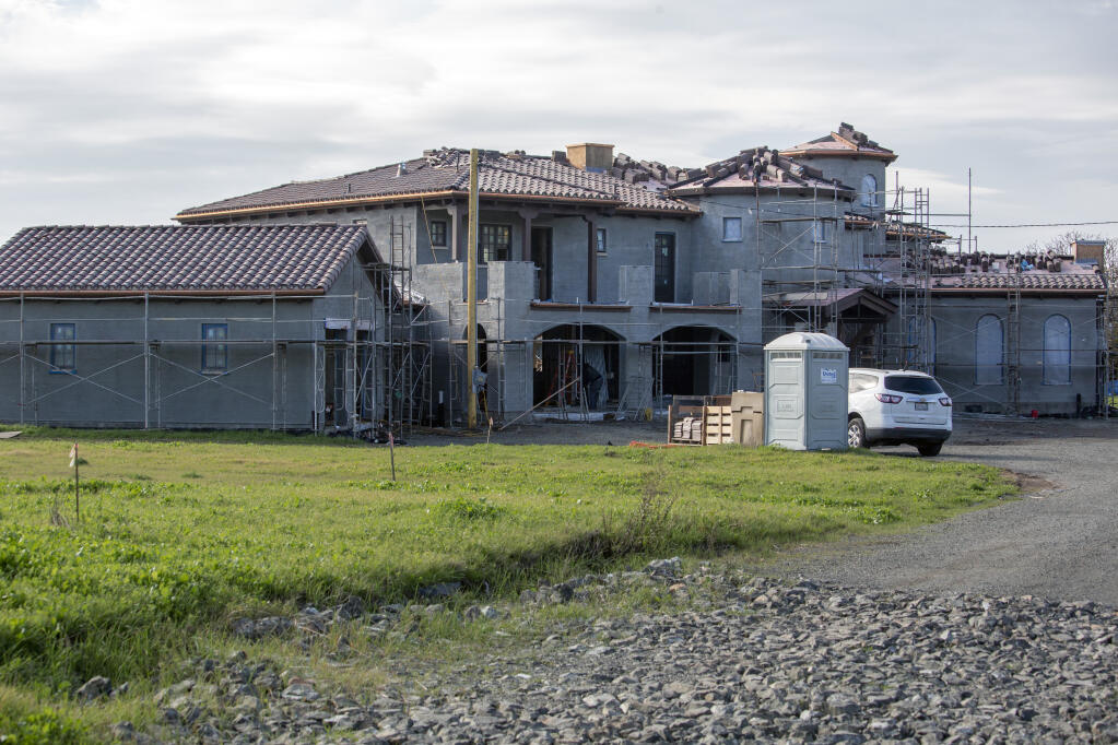 SB 9 seeks to bring smaller, workforce housing to California cities, incentivizing higher density multi-unit construction over mega-mansions like the one under construction on Eighth Street East at East Napa Street. (Robbi Pengelly/Index-Tribune)