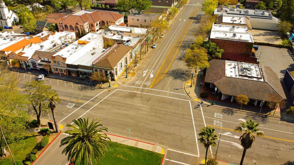 The restriping plan on the five-lane Broadway will eliminate the center divide and one southbound lane in order to make room for bike lanes and a shorter pedestrian crossing.