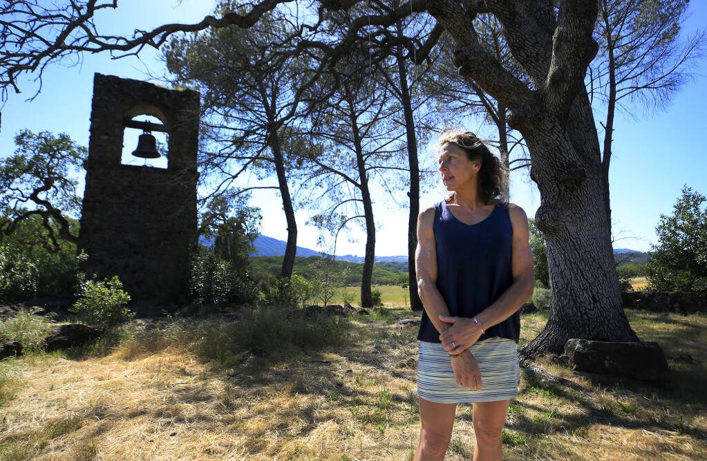 A bell tower is all that remains near the razed home of Jennifer Potts, a resource ecologist at the Bouverie Preserve in Glen Ellen, April 28, 2021. The home was destroyed during the 2017 Nuns fire. (Kent Porter / The Press Democrat) 2021