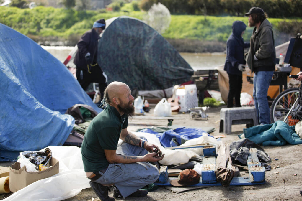 Daniel Vanderford, living at a homeless encampment at Steamer Landing in Petaluma in February 2022, said he would welcome the chance to stay at People’s Village at the Mary Isaac Center. (CRISSY PASCUAL/ARGUS-COURIER STAFF)