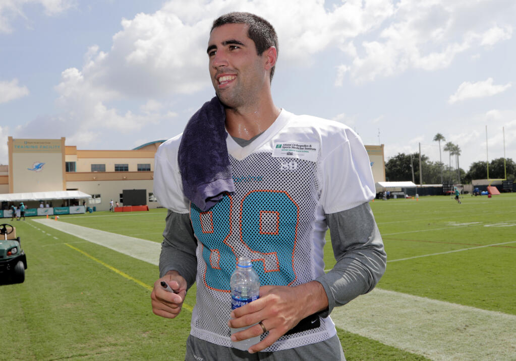 FILE - Miami Dolphins tight end Gavin Escobar walks off the field at the NFL team's training camp, July 26, 2018, in Davie, Fla. Two rock climbers, including the former NFL player, were found dead near a Southern California peak after rescue crews responded to reports of injuries, authorities said Wednesday, Sept. 29, 2022. (AP Photo/Lynne Sladky)