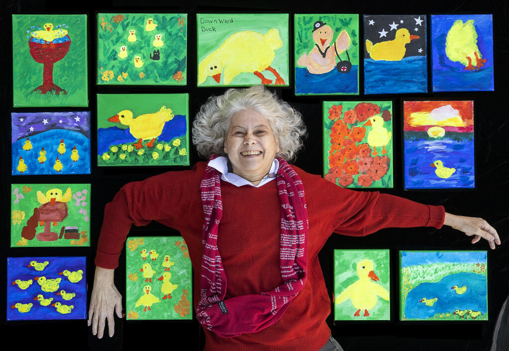 Angela Marciano painted a series of small canvasses for her children's book "Limoncello and the Great Illness." Marciano submitted the pieces and the book for the Sonoma Responds exhibit sponsored by the Sonoma County Library.  (John Burgess / The Press Democrat)