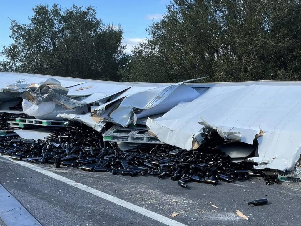 A big rig spilled 10,000 empty wine bottles on Highway 101 near Healdsburg, Monday, March 21, 2023. (CHP - Santa Rosa / Facebook)