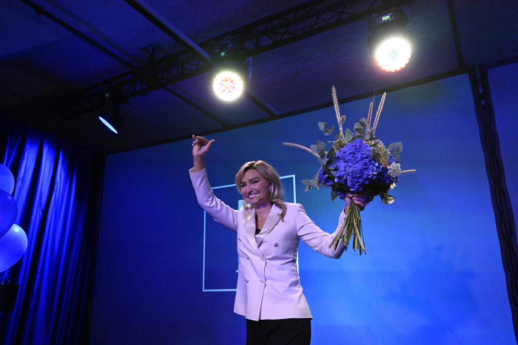 Party leader of the Christian Democrats, Ebba Busch, gives a speech during the party's election watch at the Sergel Hub in Stockholm, Sweden, late Sunday evening, Sept. 11, 2022. An exit poll projected that Sweden’s ruling left-wing Social Democrats have won the most votes in a general election Sunday, while a right-wing populist party had its best showing yet. (Pontus Lundahl/TT News Agency via AP)