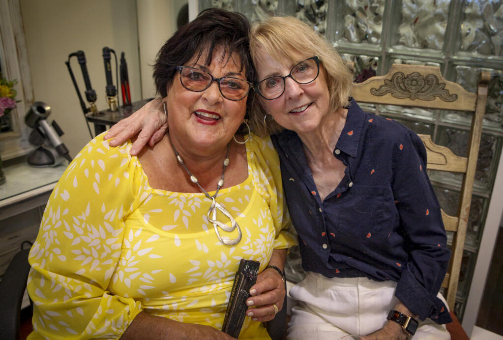 Cathi Cordi (left) poses with Lorraine Dixon (right) who she started the Capelli Hair Design with over 40 years ago. _Wednesday, July 20,2022._Petaluma, CA, USA._(CRISSY PASCUAL/PETALUMA ARGUS-COURIER STAFF)
