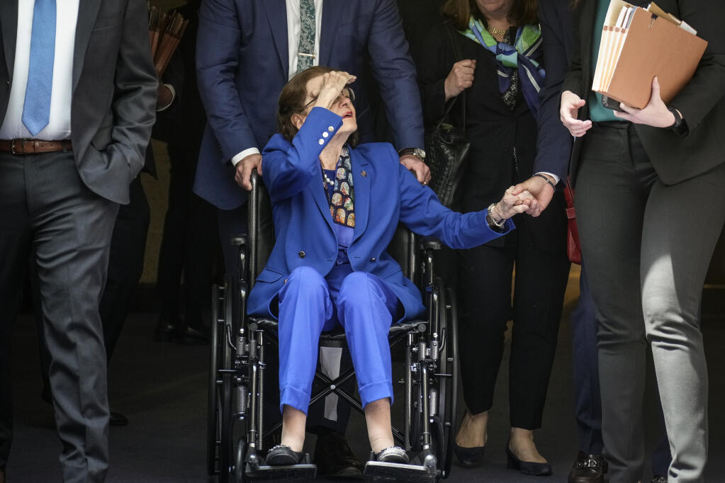 U.S. Sen. Dianne Feinstein (D-California) is pushed in a wheelchair as she departs a business hearing of the Senate Judiciary Committee on Capitol Hill May 11, 2023, in Washington, D.C. This was Feinstein&apos;s first hearing after fighting a case of shingles and being absent from the Senate for almost three months. (Drew Angerer/Getty Images/TNS)