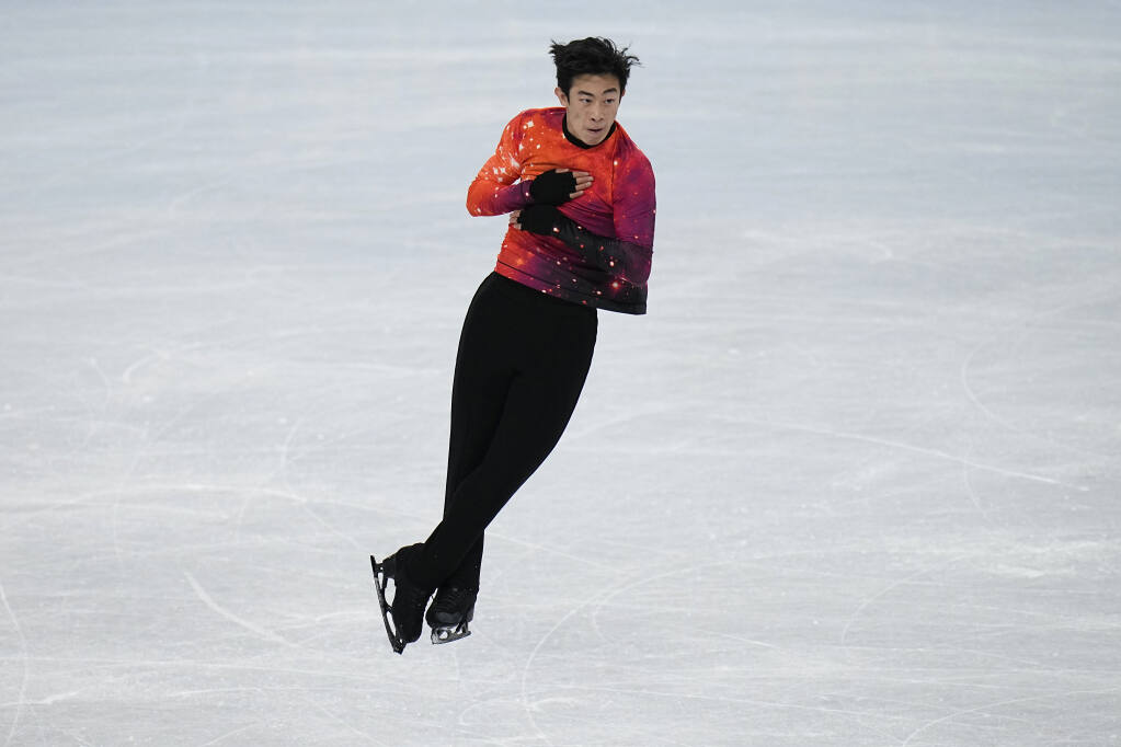 Nathan Chen, of the United States, competes in the men's free skate program during the figure skating event at the 2022 Winter Olympics, Thursday, Feb. 10, 2022, in Beijing. (AP Photo/Jae C. Hong)