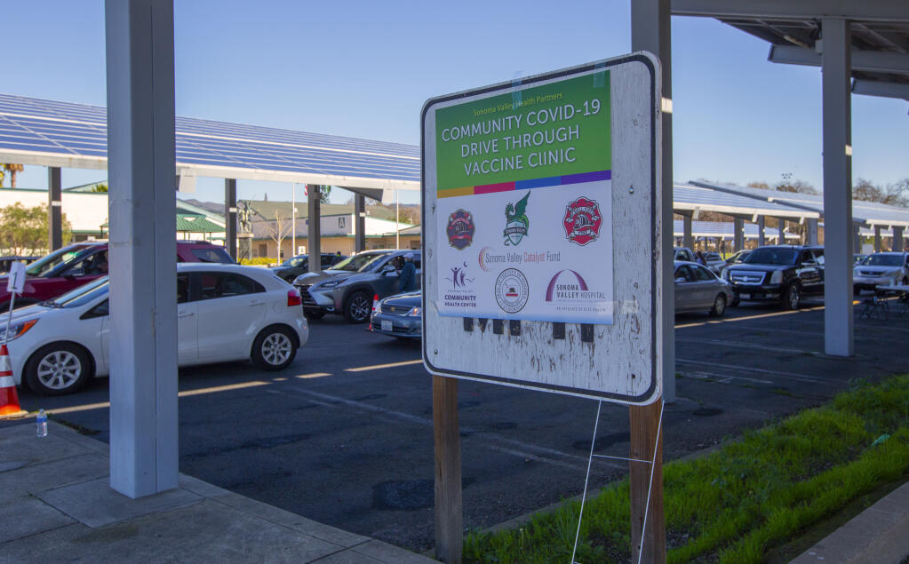 A drive-through vaccine clinic at Sonoma Valley High School in February. Another is scheduled, for teens, on May 12.  (Robbi Pengelly/Index-Tribune)