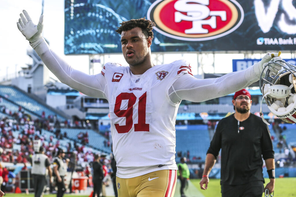 San Francisco 49ers defensive end Arik Armstead walks off the field after beating the Jaguars on Sunday, Nov. 21, 2021, in Jacksonville, Florida. (Gary McCullough / ASSOCIATED PRESS)