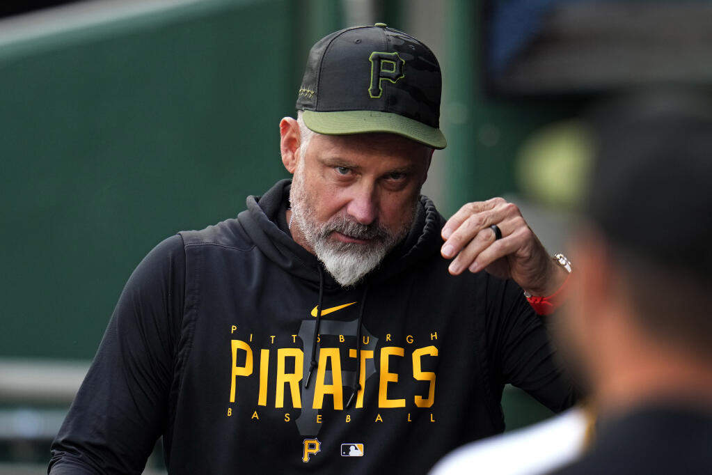 Pittsburgh Pirates manager Derek Shelton walks in the dugout before a baseball game against the Oakland Athletics in Pittsburgh, Monday, June 5, 2023. (AP Photo/Gene J. Puskar)