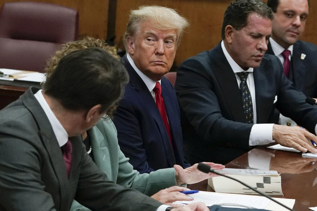 Former President Donald Trump appears in court for his arraignment, Tuesday, April 4, 2023, in New York. (Timothy A. Clary/Pool Photo via AP)