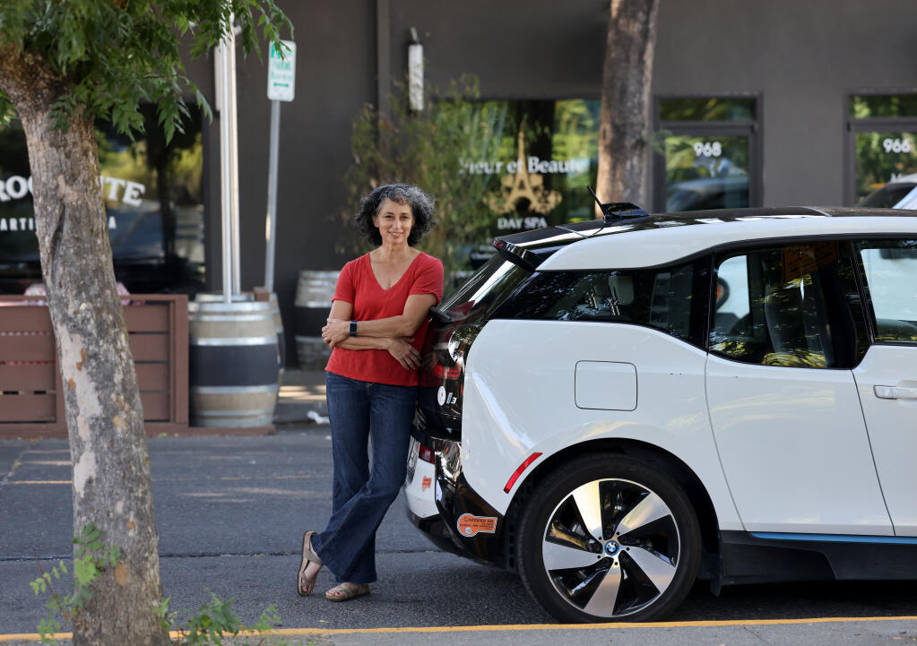 Michelle Erbs stands at the spot on Pearl Street where a man accidentally stole her car while getting confused using the carsharing company Turo. Photo taken in Napa, Monday, Sept. 11, 2023. (Beth Schlanker / The Press Democrat)