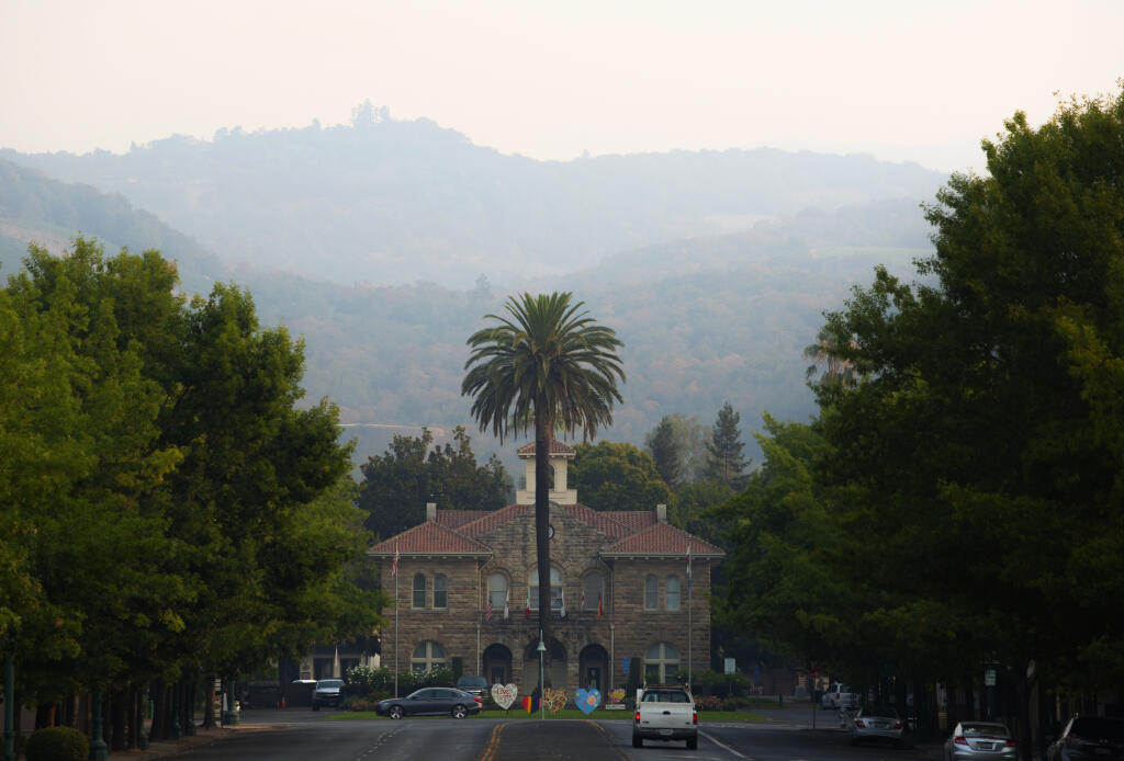 Smoke from nearby fires cloaked the Valley and obscured the hills behind City Hall on Monday, Aug. 24. (Photo by Robbi Pengelly/Index-Tribune)