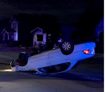 A man was taken to the hospital and later arrested for driving under the influence after his car rolled over after a collision with a parked car in Petaluma Friday evening. (Image via Nixle)