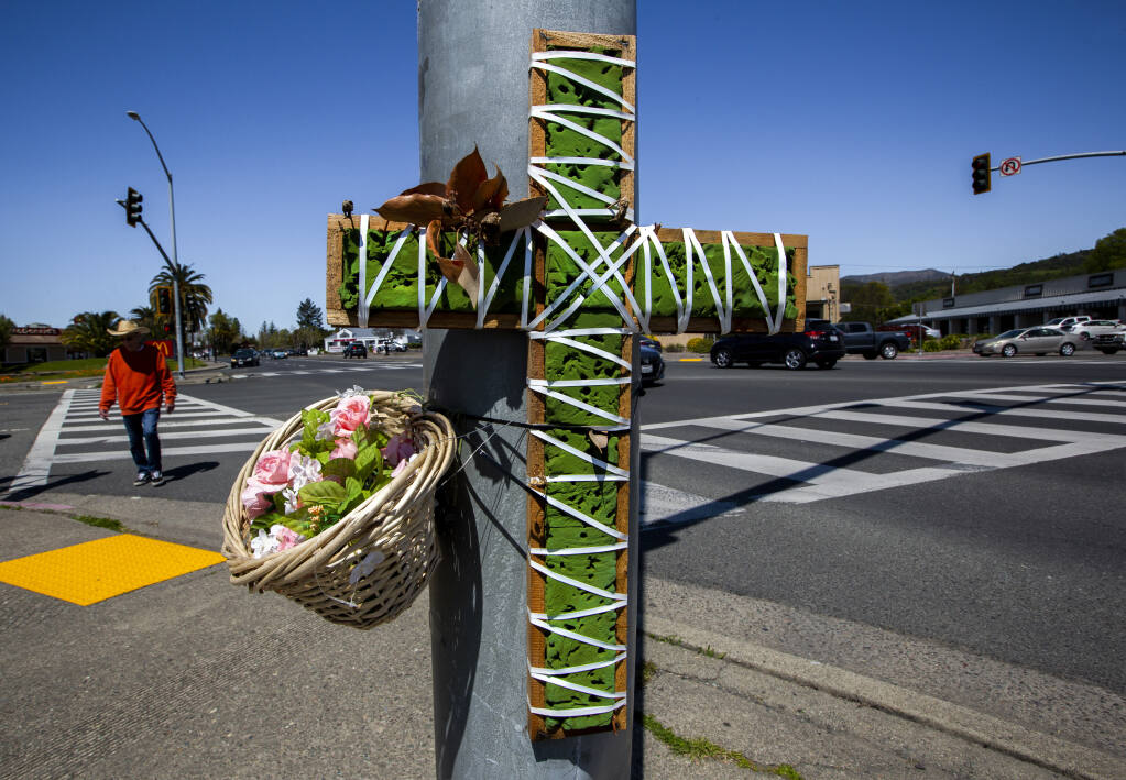 A memorial honors the recent pedestrian deaths at Highway 12 and Verano Avenue in Boyes Hot Springs. (Robbi Pengelly/Index-Tribune)