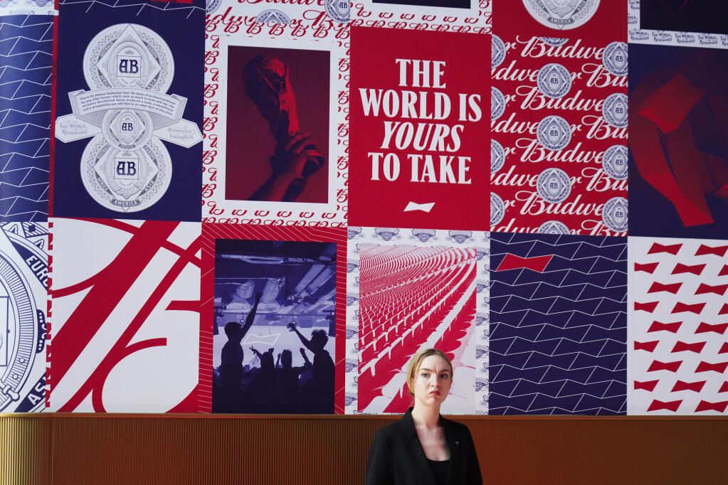 Ads for Budweiser are seen at a hotel hosting a major bar for the beermaker in Doha, Qatar, Friday, Nov. 18, 2022. (Jon Gambrell / ASSOCIATED PRESS)