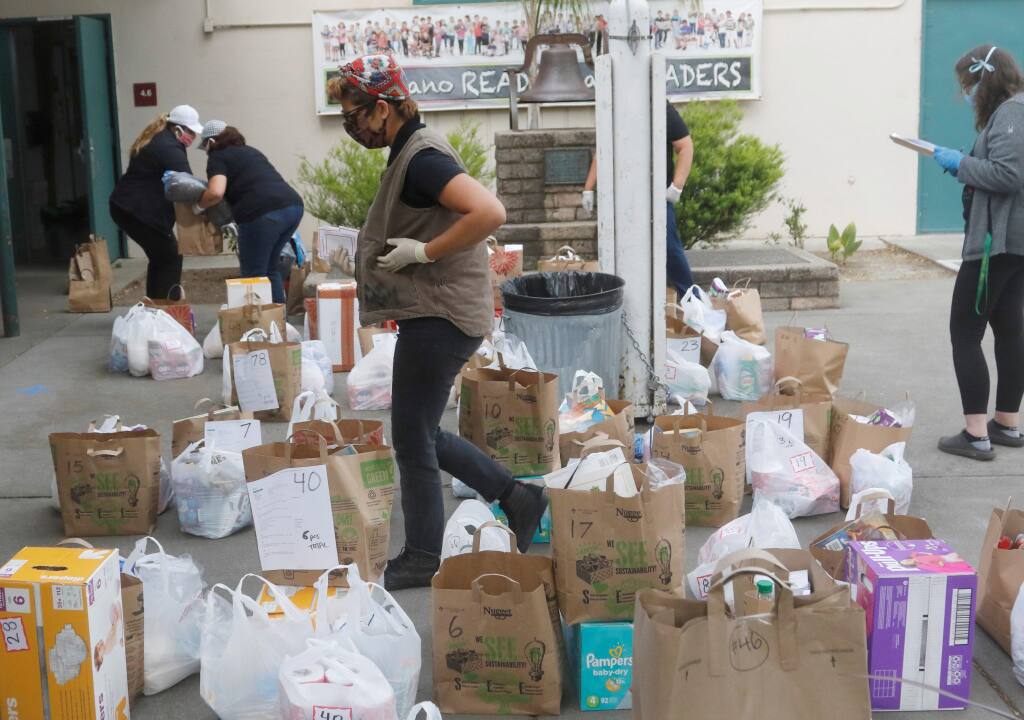 Food for All / Comida para Todos gives away hundreds of bags of groceries each week in Sonoma Valley. (Index-Tribune file photo)