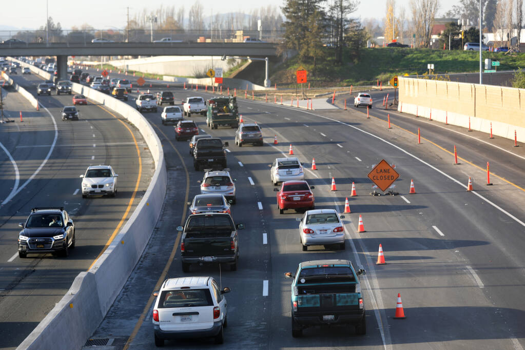 Traffic slows traveling northbound on Hwy 101 before the E. Washington St. overpass in Petaluma, Calif., on Wednesday, December 1, 2021.(Beth Schlanker/The Press Democrat)