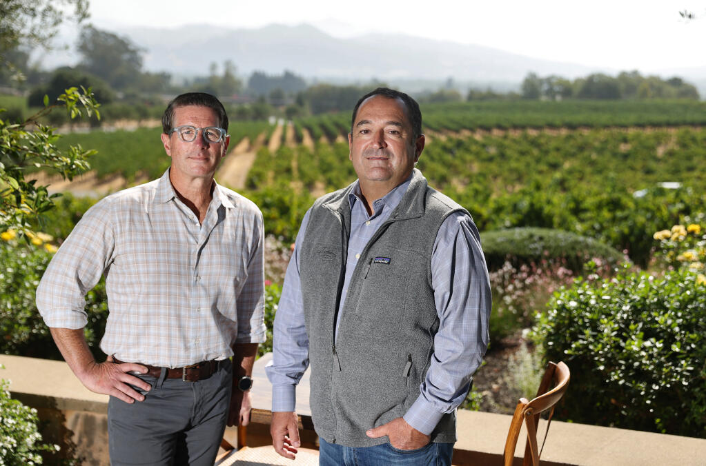 Chris Indelicato, CEO of Delicato Family Wines, right, and Corey Beck, executive vice president of winery operations, at Francis Ford Coppola Winery in Geyserville in 2021. Francis Ford Coppola Winery, owned by Delicato Family Wines, is entering the prosecco category for the first time. (Christopher Chung/ The Press Democrat)