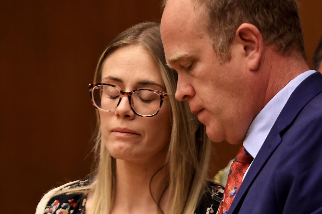 Katie Sorensen drops her eyes, as she is remanded in to custody, during her sentencing at Sonoma County Superior Court in Santa Rosa, Thursday, June 29, 2023. At left is her attorney Charles Dresow. (Kent Porter / The Press Democrat)